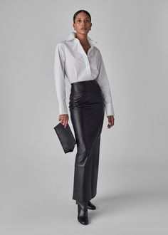 High waisted maxi pencil skirt in smooth lambskin leather. Center back invisible zip closure. Center back slit. Not lined. 100% Lambskin Leather 3097LPL-CORE Designed to be super fitted. Size up if you need more room in the hips. Approx 40" in total length Model is 5'11", and wears a size 2 Maxi Leather Skirt, Long Leather Skirt, Maxi Pencil Skirt, Full Length Skirt, Trousers Details, Full Length Skirts, Bias Binding, Black Leather Skirts, Fringe Skirt