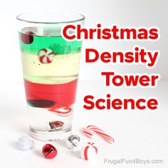 a christmas density tower science experiment with candy canes and peppermints in it