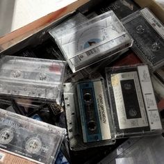 a pile of cassettes sitting on top of each other