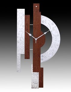 a clock made out of wood and metal