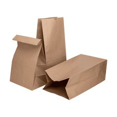 two brown paper bags sitting side by side on top of each other in different sizes