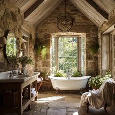 an old fashioned bathroom with stone walls and flooring is decorated in natural materials, such as wood beams