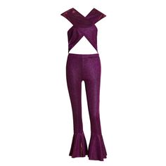 a women's purple top and pants with cutouts on the bottom, one leg in