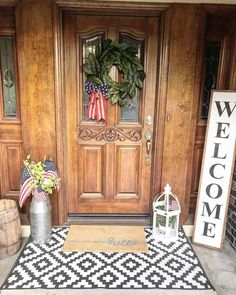 a welcome mat on the front door of a home