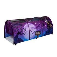 a purple tent with halloween decorations on it