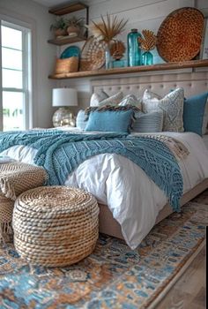 a large bed sitting in a bedroom next to two baskets on top of a rug