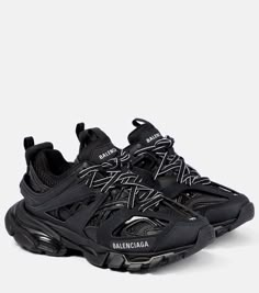 Track sneakers in black - Balenciaga | Mytheresa Tenis Balenciaga, Balenciaga Sneakers Outfit, Balenciaga Track Black, Balenciaga Track Sneakers, Track Sneakers, Balenciaga Shoes Sneakers, Pretty Sneakers, Rubber Sneakers, Black Balenciaga