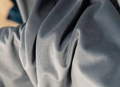 a close up view of a blue fabric