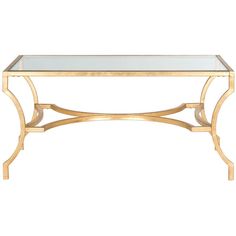 a glass and gold coffee table with metal legs