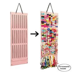 an over the door storage rack with lots of beads and hair accessories hanging from it