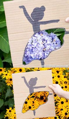 someone is holding up some paper cutouts with flowers in them and the silhouette of a dancer