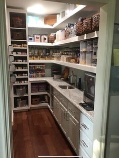 the pantry is stocked with many different items