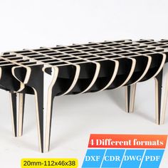 a set of four black and white tables with wooden legs on each side, one is shaped like an upside down table