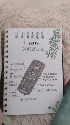 a notebook with an image of a remote control on it and the words things i can't ignore about