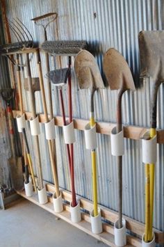 tools are lined up on a wall with the words, cheap and easy tool storage