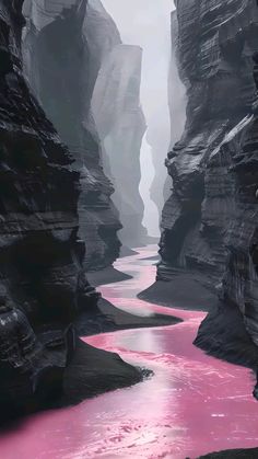 a river flowing through a canyon next to tall rocks and pink water under a cloudy sky