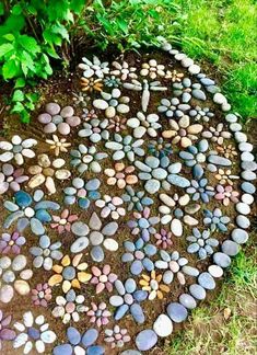 a circle made out of rocks in the grass