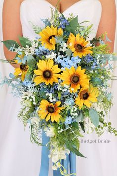 a bridal bouquet with sunflowers and blue flowers