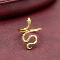 Product:-Ring Material:- Brass Size:- All size available Golden snake ring, Minimalist Ring, adjustable snake ring, open ring, brass ring, kundalini ring, snake jewellery, animal ring,Boho Ring,  ❥ Customers' satisfaction is our biggest priority, please contact us with any questions/queries for future or existing orders, and we will do our best to make sure you are happy with your order. ❥Please make sure to add the correct address during checkout. You can return your purchased item within 15 days after successful delivery. We offer a 100% "Money Back Guarantee" if you are not satisfied with your purchase. ❥If you are not satisfied with your purchased items then contact with us first before leaving negative or neutral feedback or opening disputes. We believe in solving the issues. Snake Jewellery, Golden Snake, Gothic Ring, Animal Ring, Natural Jewelry, Snake Jewelry, Animal Rings, Midi Ring, Snake Ring