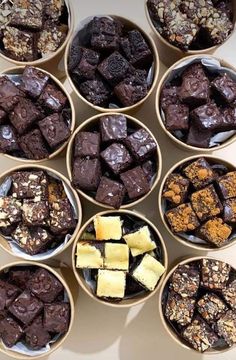 several bowls filled with different types of desserts