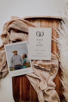 an image of a couple on their wedding day with the save the date card next to them