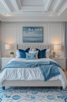 a bedroom with white walls and blue accents