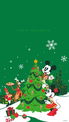 mickey and minnie mouse around the christmas tree