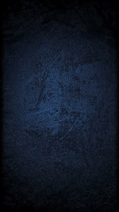 a dark blue textured background that looks like it has been painted