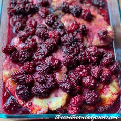 a casserole dish with fresh berries in it