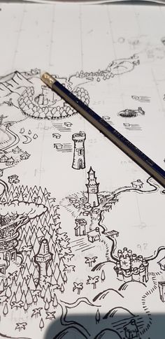 a pencil sitting on top of a drawing paper with a map in the background and a castle