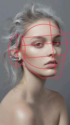 a woman's face with red lines over it