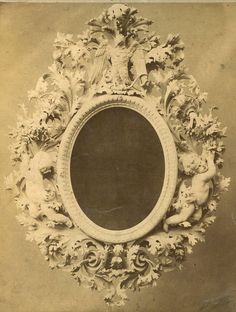 an antique photo with angels and cherubs around a round mirror on the wall