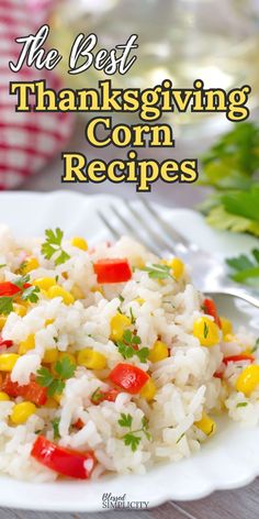 a white plate topped with rice covered in corn and garnished with cilantro