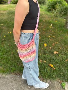 These cute and practical crocheted cross-body bags are perfect for carrying essentials on the go. You can carry your phone, wallet, gum, some spare cash, etc. These bags also make perfect gifts for anyone from your daughter, to your best friend, or even your mom who wants to have some fun with a bright, colorful, and practical accessory! This stylish bag measures about 9 inches tall and 9.5 inches wide with a strap that measures about 38 inches long and 1.5 inches wide. Crocheted Cross, Crochet Rainbow, Gifts For Anyone, Your Mom, Phone Wallet, Stylish Bag, Have Some Fun, Cross Body Handbags, Purses And Handbags