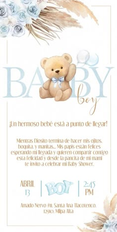 a baby shower with a teddy bear and blue flowers on it's back side