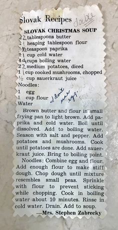 the recipe for slow cooker christmas soup is displayed on a marble slab with writing