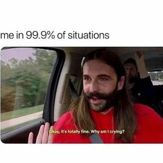 a man with long hair sitting in the back seat of a car and talking to someone