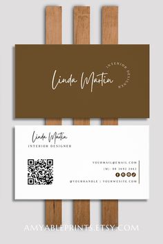 a business card that has been designed to look like wood planks with the name linda martin on it