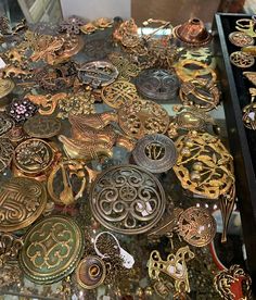 there are many different types of jewelry on display