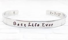 "Stamped with \"Best Life Ever\", a timeless, unique and personalized baptism gift for adults and teens who decide to be baptized along with the date of baptism and the initials at your choice. This bracelet designs to beautify your hand. 1. Please leave date in \"note to seller\" box at checkout. The date will be stamped in format \"7.16.17\" OR \"16.7.17\" due to some counties read in this format. If no specify, the date will always be stamped in format\"7.16.17\" 2. Choose INITIALS at options Hand Stamped Bracelets For Father's Day, Personalized Adjustable Bracelets For Wedding Gift, Personalized Adjustable Bracelets As Wedding Gift, Best Life Ever Jw, Baptism Bracelet, Adult Baptism Gifts, Adult Baptism, Best Life Ever, Jw Gifts