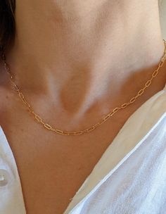 14k Gold-filled chunky paperclip adjustable length chain necklace!  This elegant timeless necklace is a must have.  Stunning worn on its own or layered with other pieces. 🤍14k Gold filled chains and findings 🤍All Gold Filled Findings, so items will not tarnish✨ 🤍Come packaged and ready to gift.  🤍 Hypoallergenic jewelry that will last!    ⚜️ Gold filled products differ from gold plated.  Here are the major differences. Gold Filled: ✔️Affordable cost and great quality  ✔️Great for everyday wear ✔️Leave it on even when showering, water resistant! ✔️Tarnish resistant  ✔️Hypoallergenic  ✔️Gold layer is thicker than gold plated and bonded to base metal rather than painted on! Gold Plated ‼️OUR JEWELRY IS NOT GOLD PLATED‼️ Likely to tarnish fast Not always safe for sensitive skin  Not great Layer Chain Necklace, Timeless Necklace, Layer Chain, Paperclip Chain Necklace, Layered Chain Necklace, Necklace Chunky, Hypoallergenic Jewelry, Trombone, Paper Clip