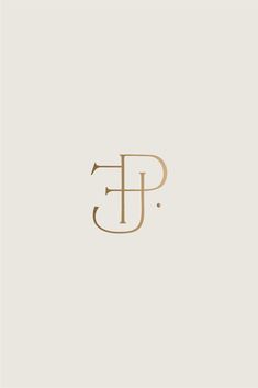 the letter f is made up of gold foil and has an elegant monogramic design