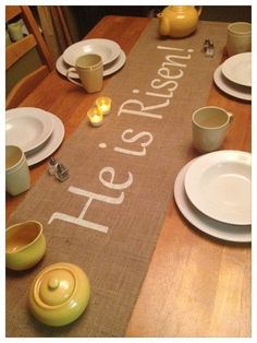 the table is set with plates, cups and saucers on it that says hello fresh