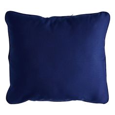 a blue pillow on a white background