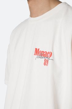 the Vintage Monaco Tee features our custom-developed wash and screen print process that replicates a true vintage hand feel, color, and print. the tee is a relaxed fit with a standard hem and is printed and washed in the USA. Details relaxed fit 100% cotton fabric model is 6’0, 140 lbs and wears a size medium Luxury Graphic Tees, Vintage Merch Design, Bar Merch, Colorful Tshirts, Simple Tshirt Design, Monaco Fashion, Vintage Monaco, Typography Tee Shirt, High Density Print