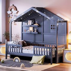 a child's bedroom with a bunk bed in the middle and toys on the floor