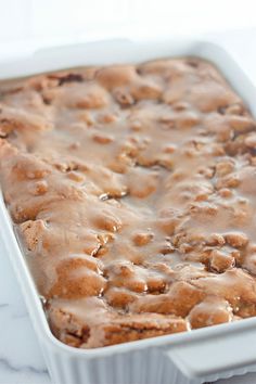 a casserole dish filled with some type of dessert