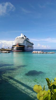 a cruise ship is docked in the water