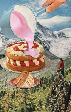 a person pouring icing onto a cake on top of a plate with mountains in the background