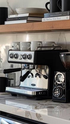 an espresso machine sitting on top of a counter